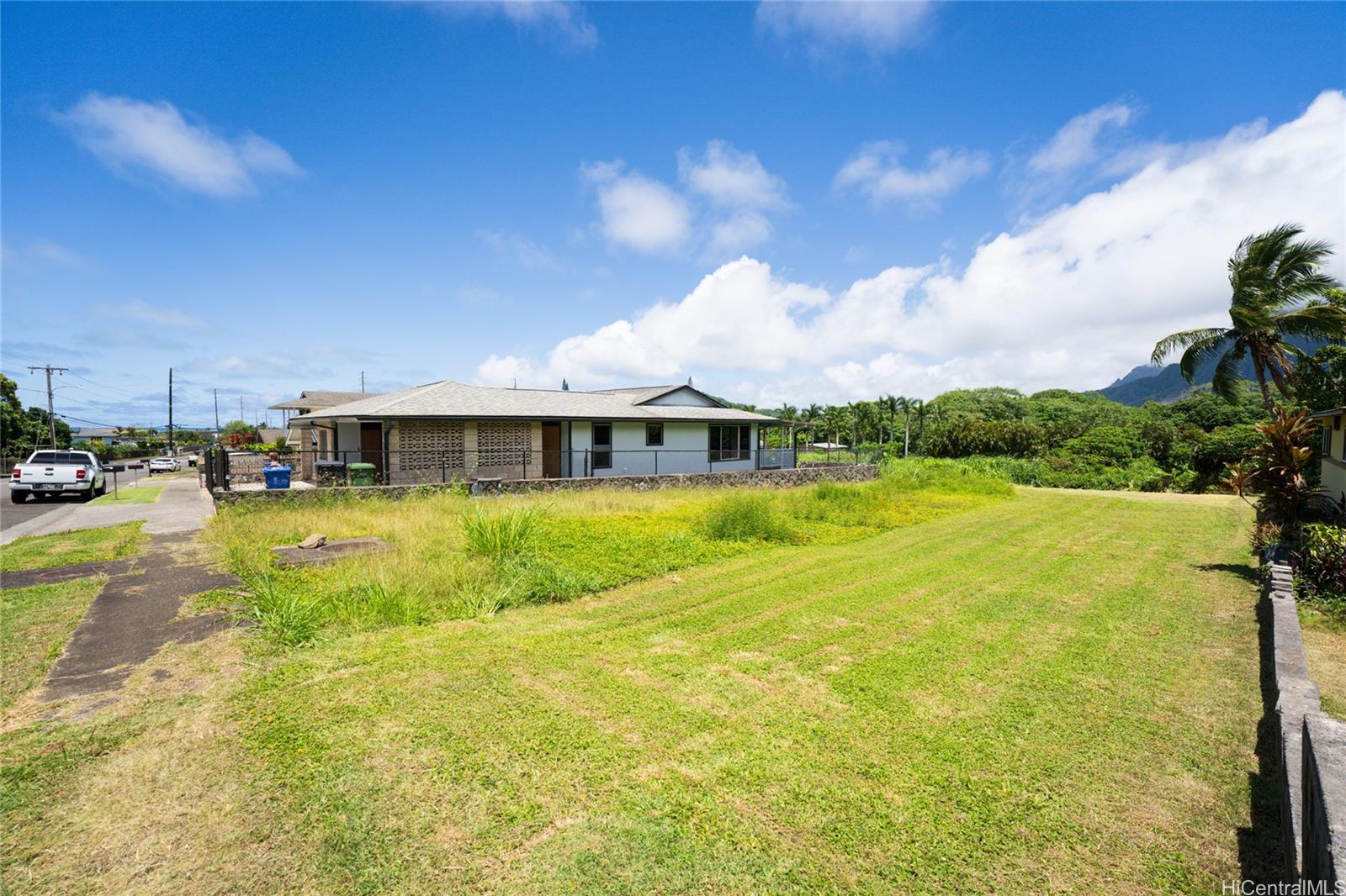 47-318 Waihee Road Kaneohe, HI 96744 - Photo 10 of 15 a front view of a house with a yard
