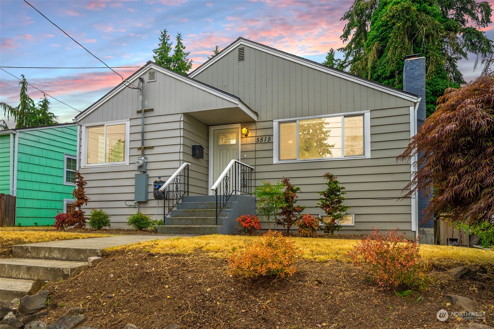 5515 South Bangor Street Seattle, WA 98178 - Photo 1 of 33 a view of a house with a yard