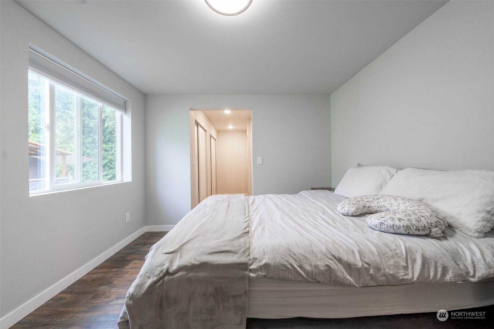 5515 South Bangor Street Seattle, WA 98178 - Photo 12 of 33 a bedroom with a bed and a window