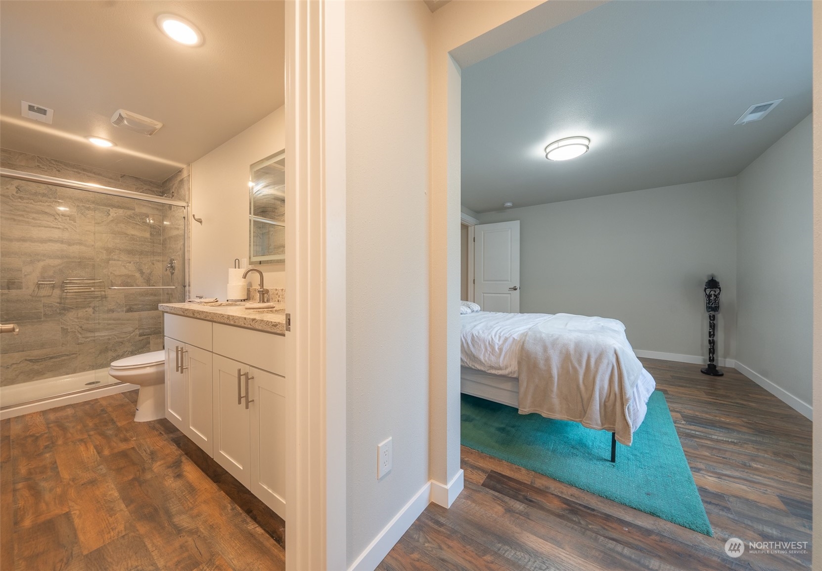 5515 South Bangor Street Seattle, WA 98178 - Photo 13 of 33 a en suite bathroom with a sink and a mirror