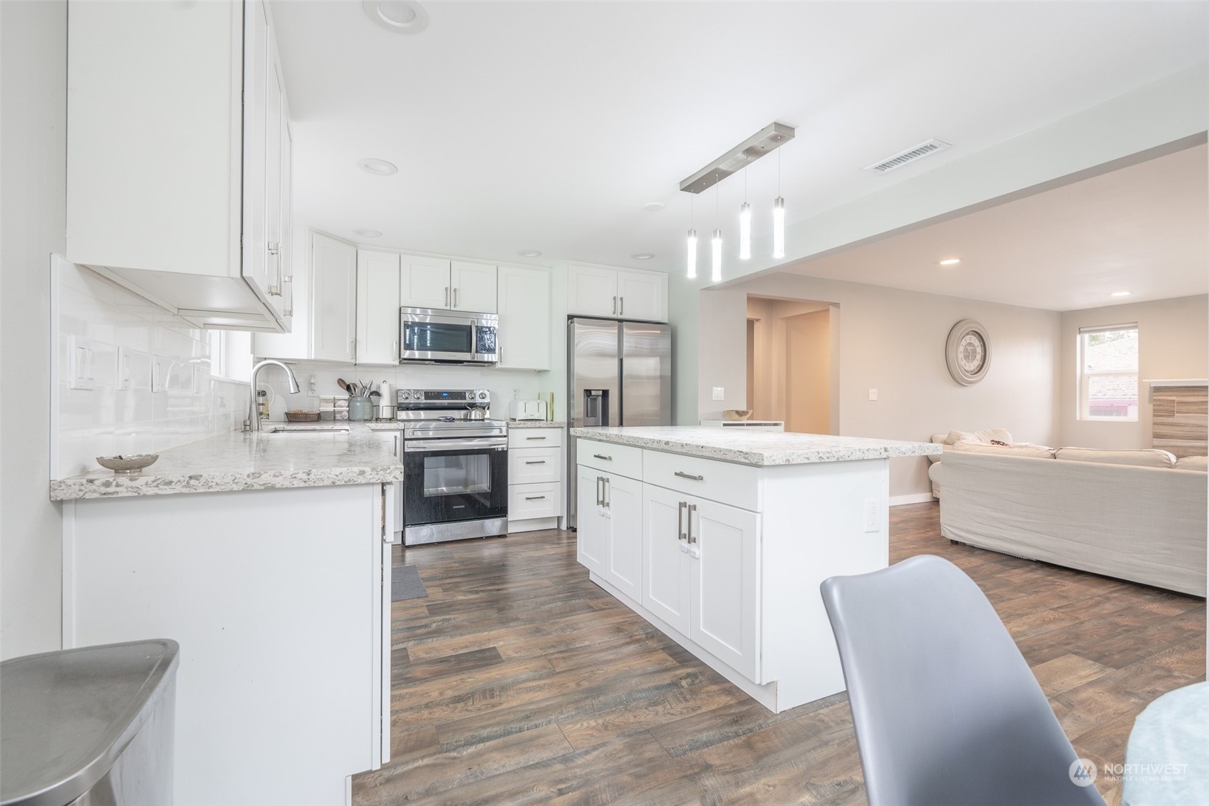 5515 South Bangor Street Seattle, WA 98178 - Photo 2 of 33 a large kitchen with granite countertop lots of counter top space