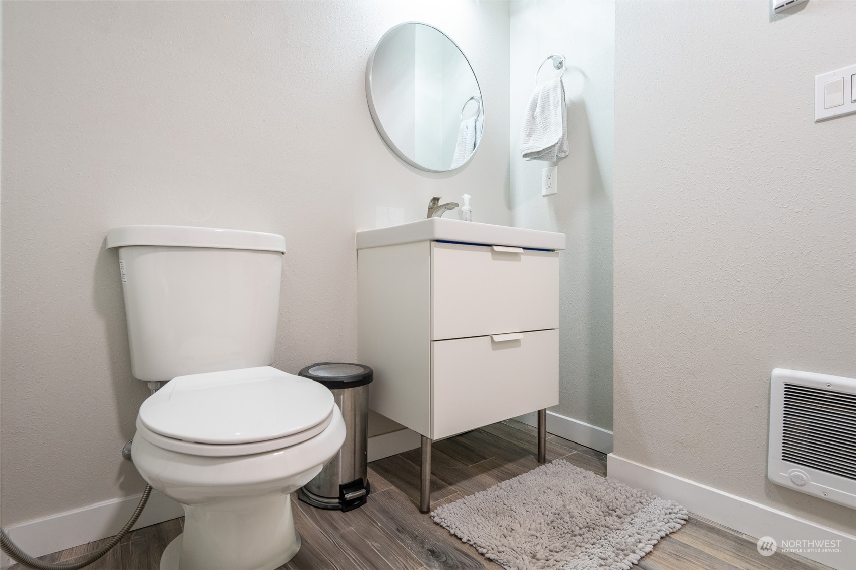 5515 South Bangor Street Seattle, WA 98178 - Photo 29 of 33 a bathroom with a toilet and a mirror