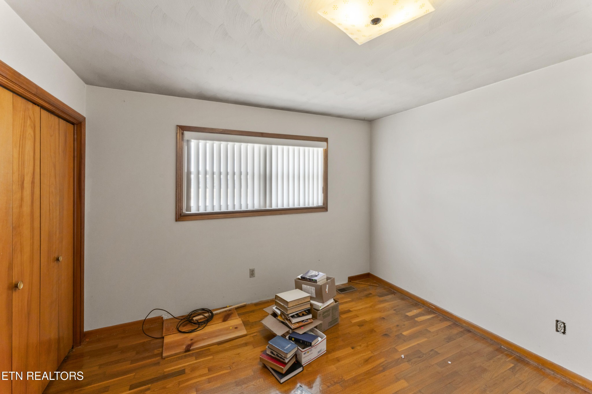 145 Short Street Kingston, TN 37763 - Photo 13 of 29 a bedroom with a bed and a window