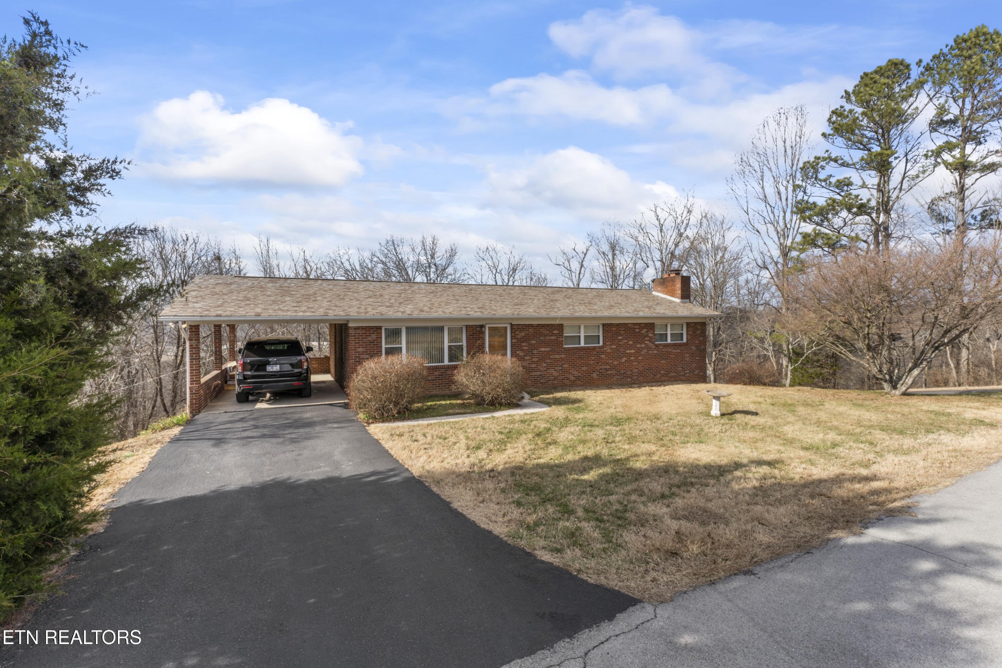 145 Short Street Kingston, TN 37763 - Photo 2 of 29 a view of a house with snow in the background