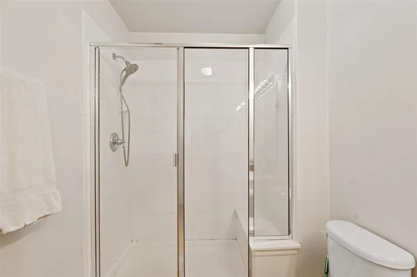a bathroom with a sink double vanity and a mirror