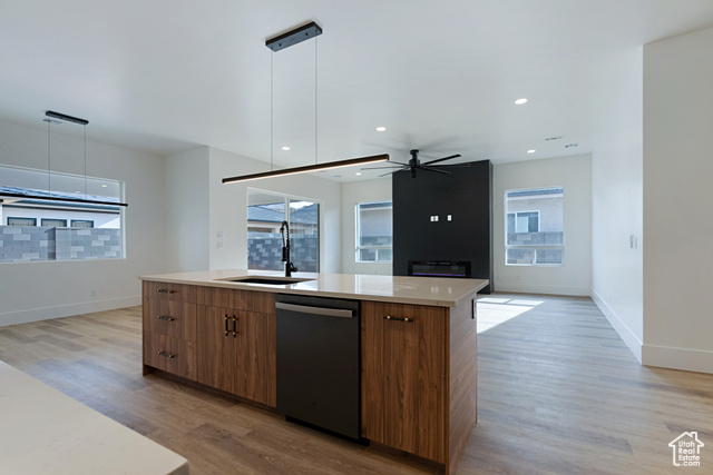 3145 Snow Cyn Road Hurricane, UT 84737 - Photo 10 of 38 Kitchen featuring dishwasher, light wood-style floors, modern cabinets, an island with sink, and recessed lighting