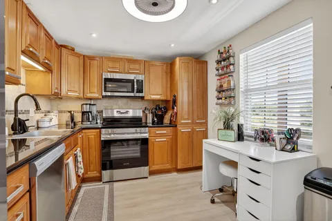 $310,000 | 3960 Oaks Clubhouse Drive, Unit 504, Pompano Beach, FL 33069