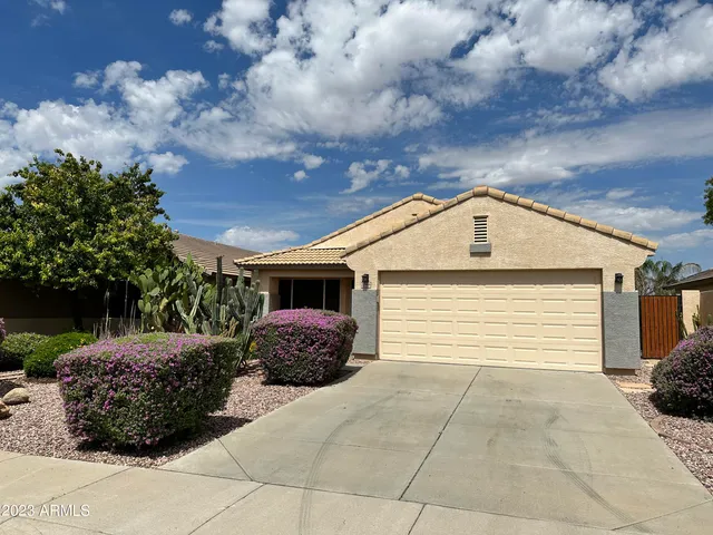 a house view with a backyard space