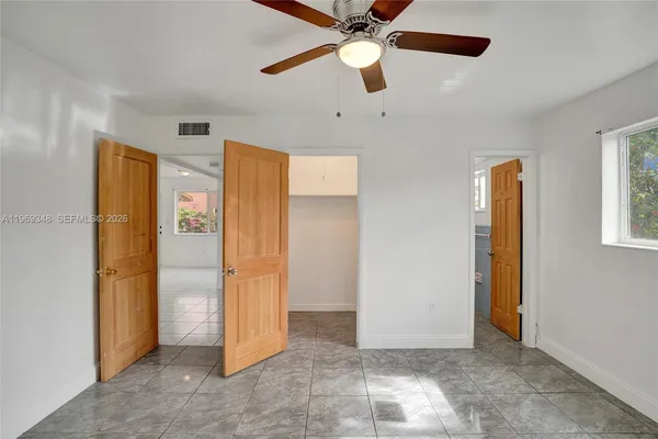 a view of an empty room with window