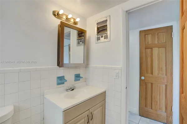 a view of an empty room with a sliding door