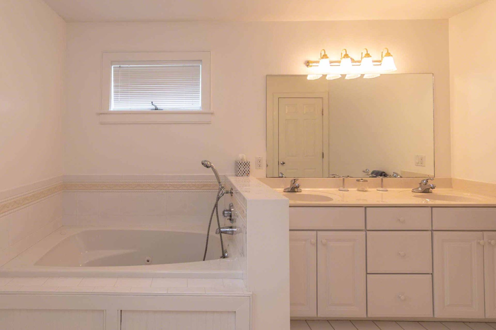 29 Pradas Way Edgartown, MA 02539 - Photo 15 of 30 a bathroom with a sink and a mirror