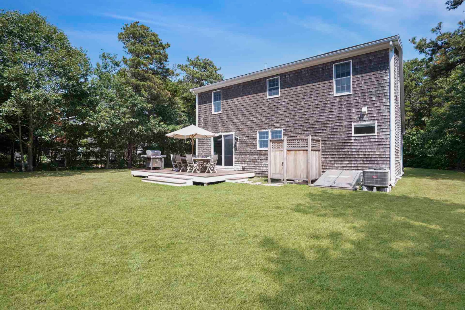 29 Pradas Way Edgartown, MA 02539 - Photo 29 of 30 a front view of a house with a yard