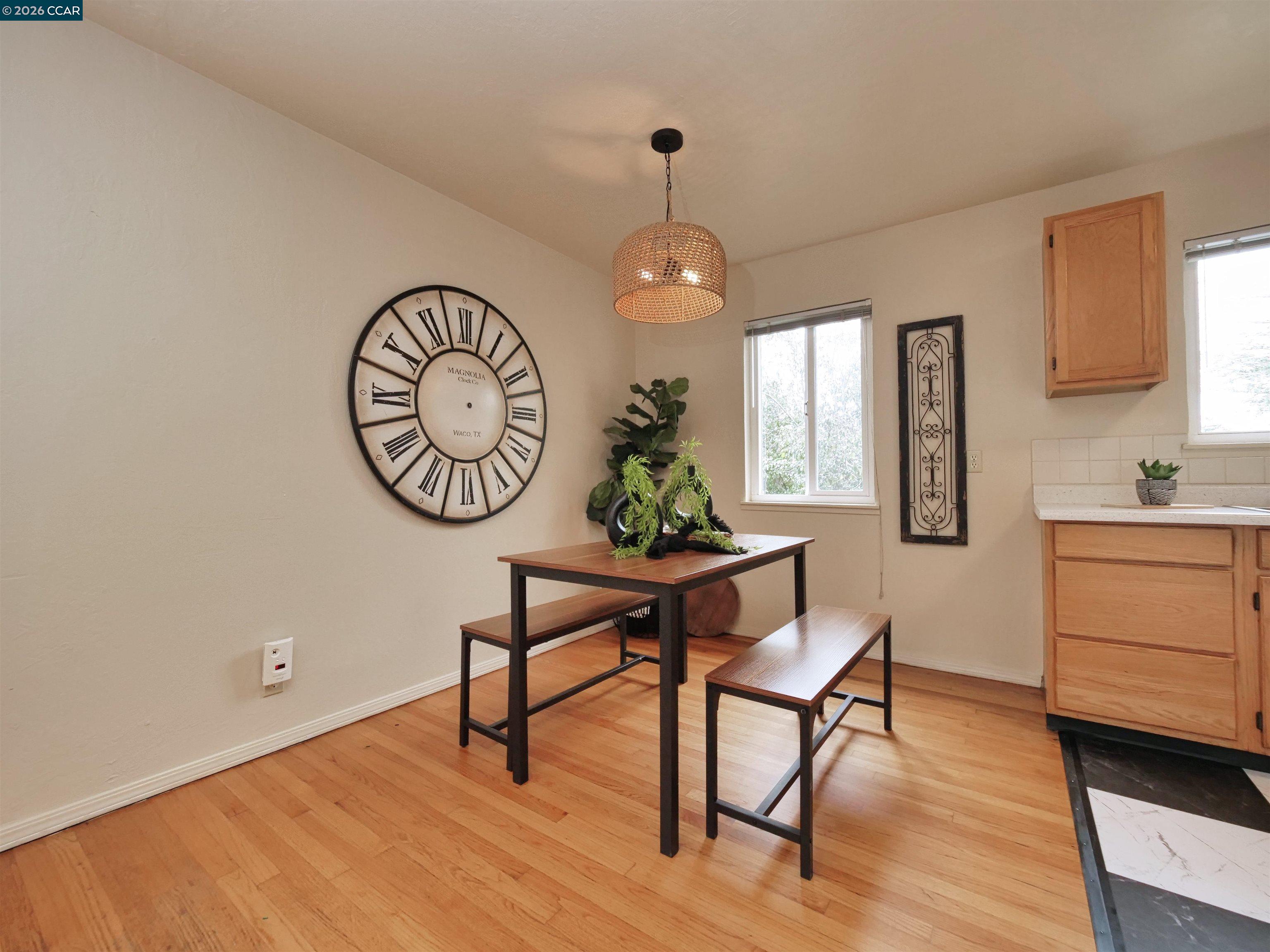 995 Virginia Street Berkeley, CA 94710 - Photo 20 of 59 a view of a room with furniture and wooden floor