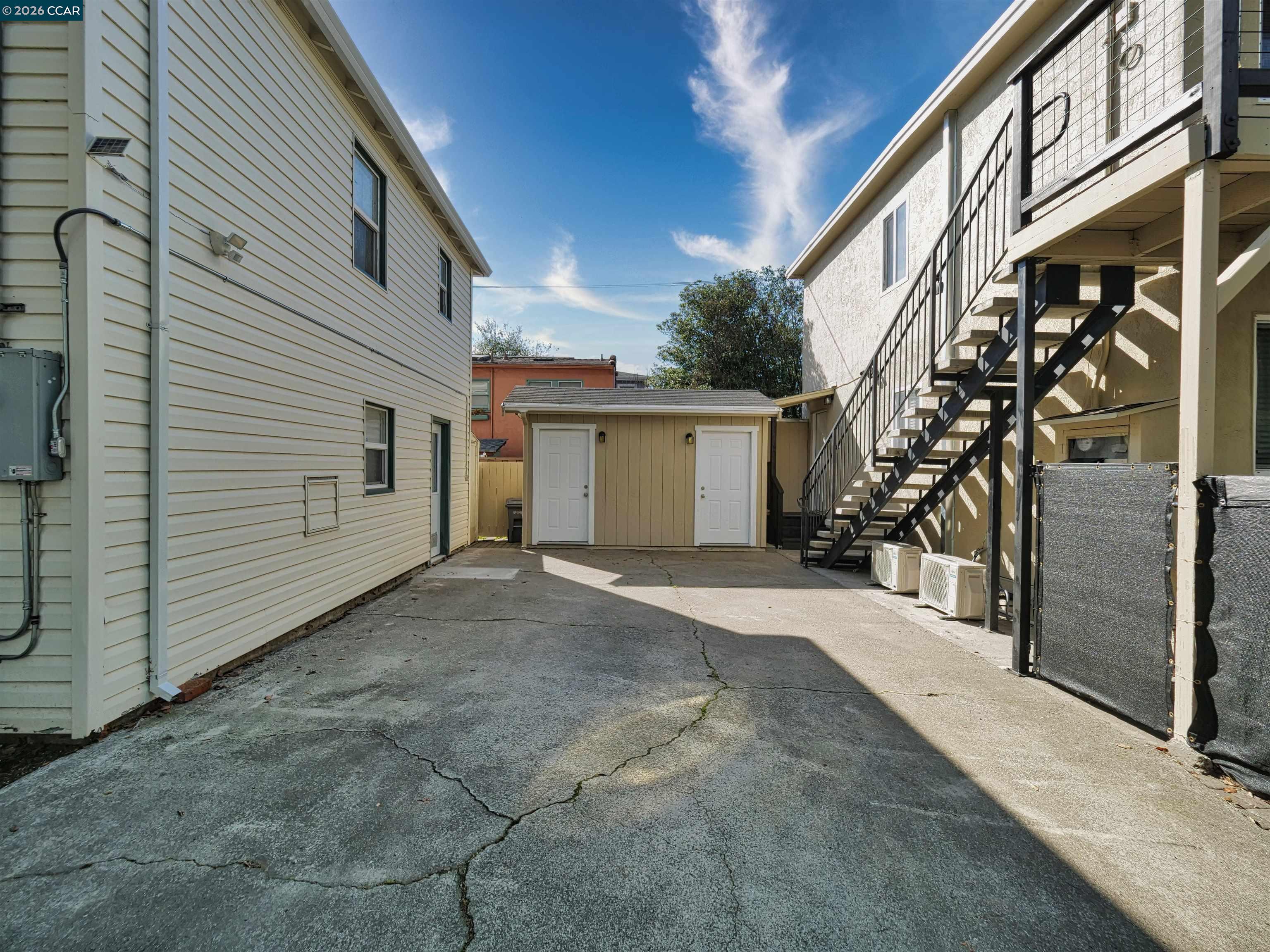 995 Virginia Street Berkeley, CA 94710 - Photo 9 of 59 a view of a house with a backyard