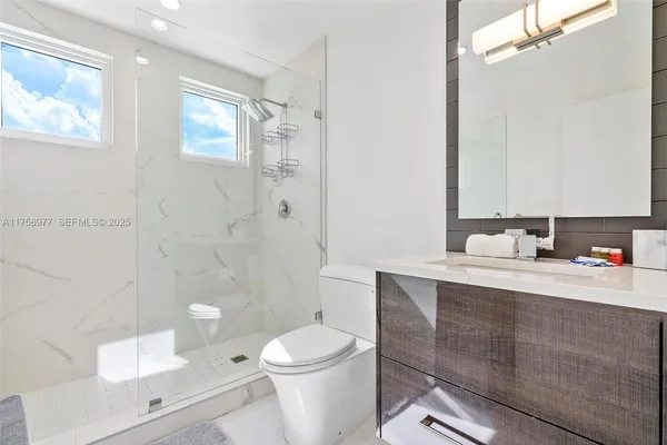 a bed room with a bed and window