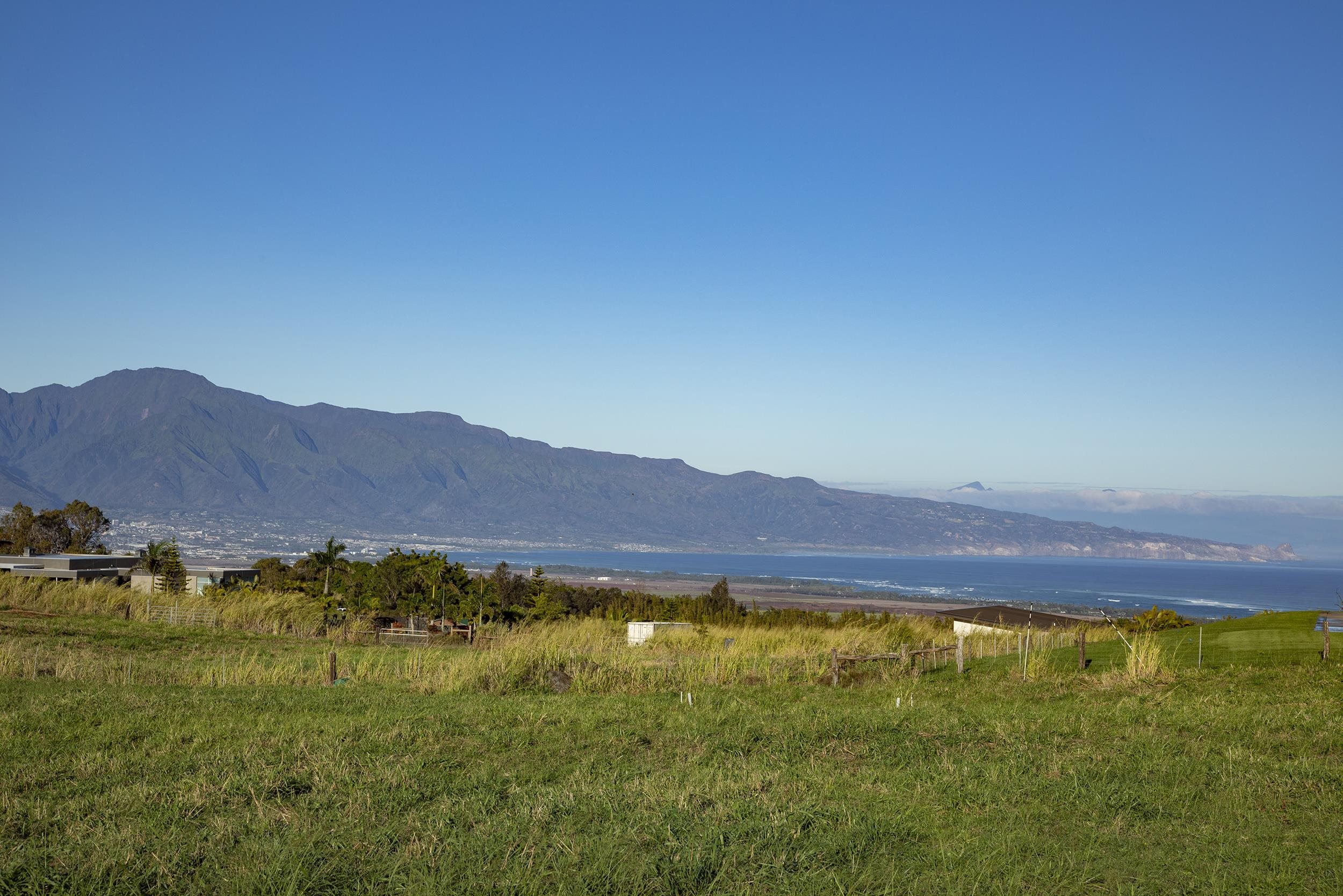 2390 Baldwin Avenue, Unit A Makawao, HI 96768 - Photo 1 of 8 a view of an ocean from a mountain