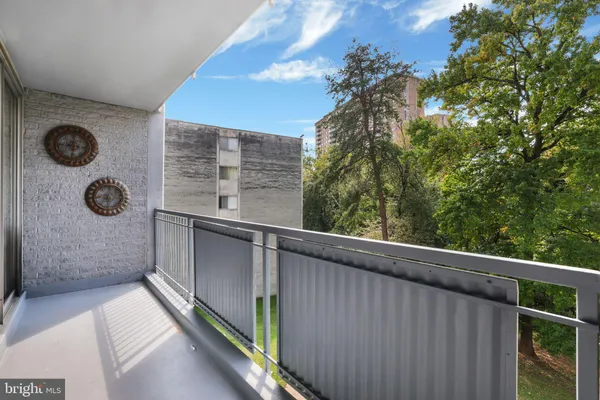 a balcony with next to a window