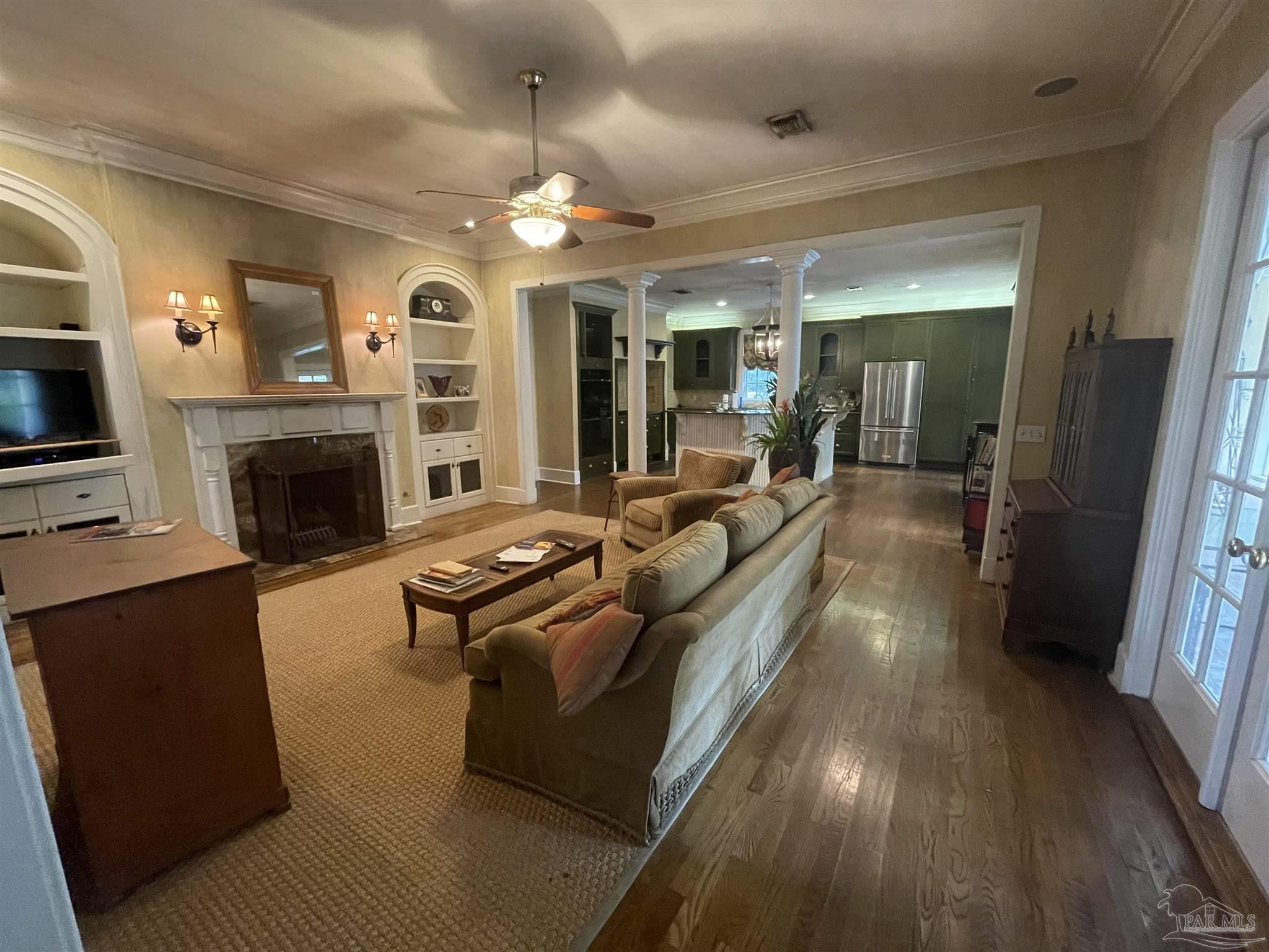 1904 East La Rua Street Pensacola, FL 32501 - Photo 12 of 14 a living room with furniture and a fireplace