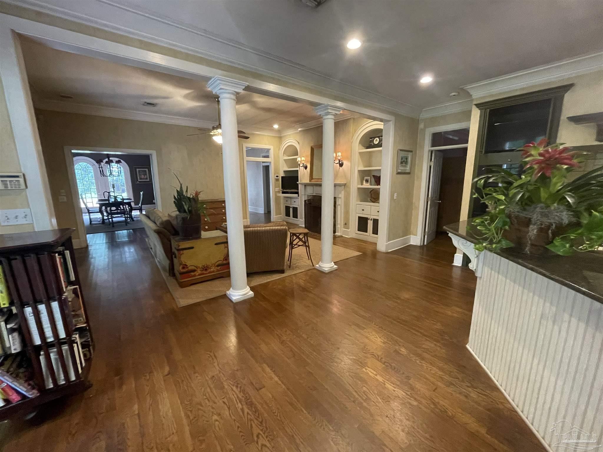1904 East La Rua Street Pensacola, FL 32501 - Photo 13 of 14 a living room with furniture and wooden floor