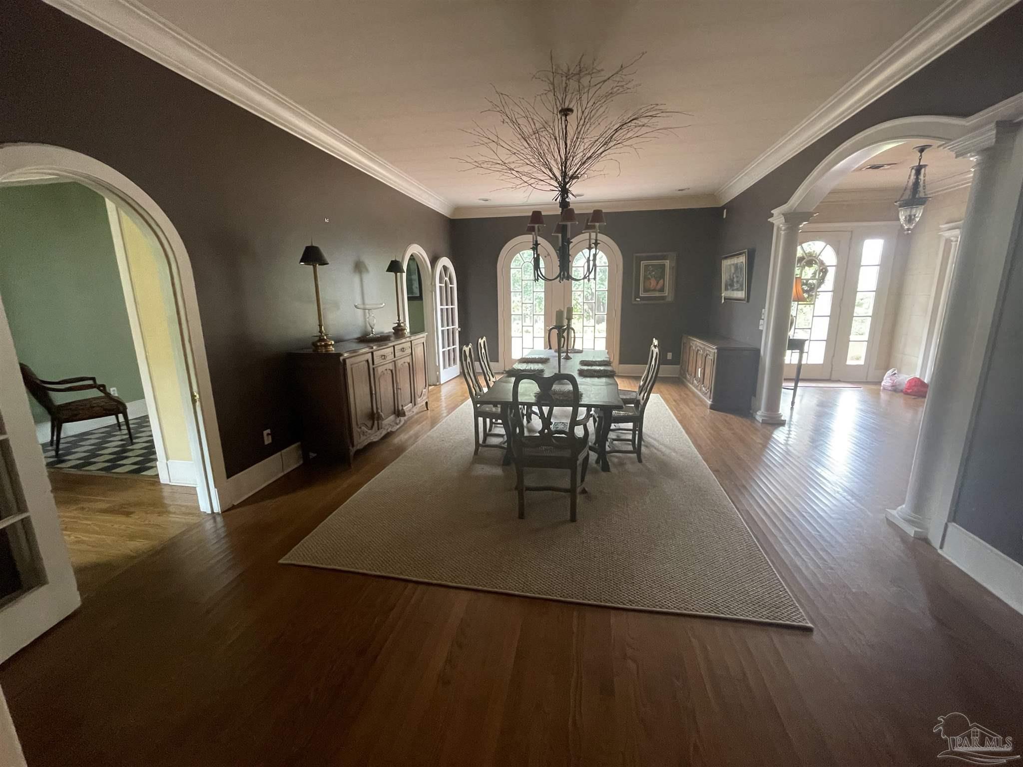 1904 East La Rua Street Pensacola, FL 32501 - Photo 14 of 14 a view of a dining room with furniture window and wooden floor