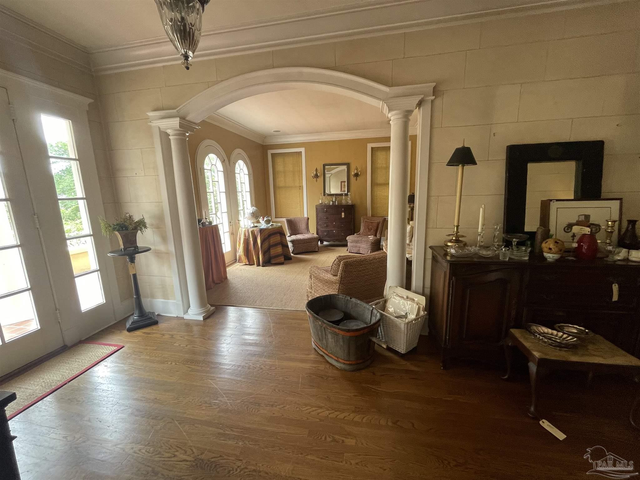 1904 East La Rua Street Pensacola, FL 32501 - Photo 4 of 14 a living room with furniture and a large window
