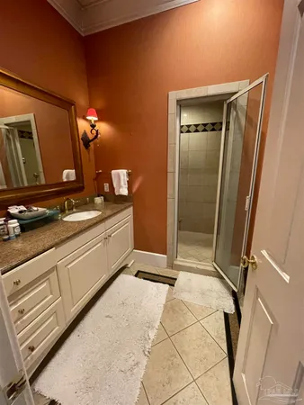 a bedroom with a bed and furniture