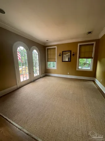 an empty room with windows