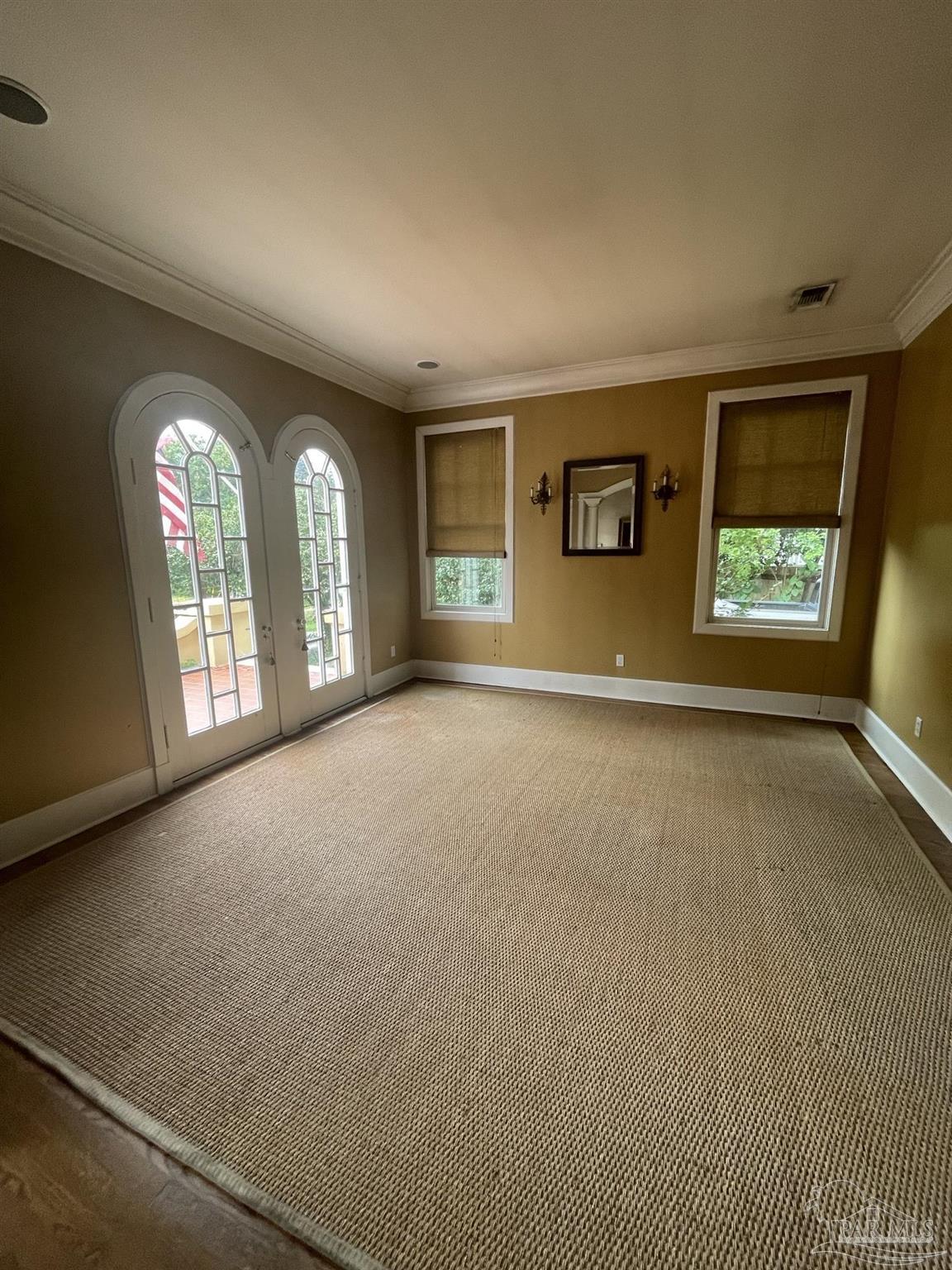1904 East La Rua Street Pensacola, FL 32501 - Photo 8 of 14 an empty room with windows