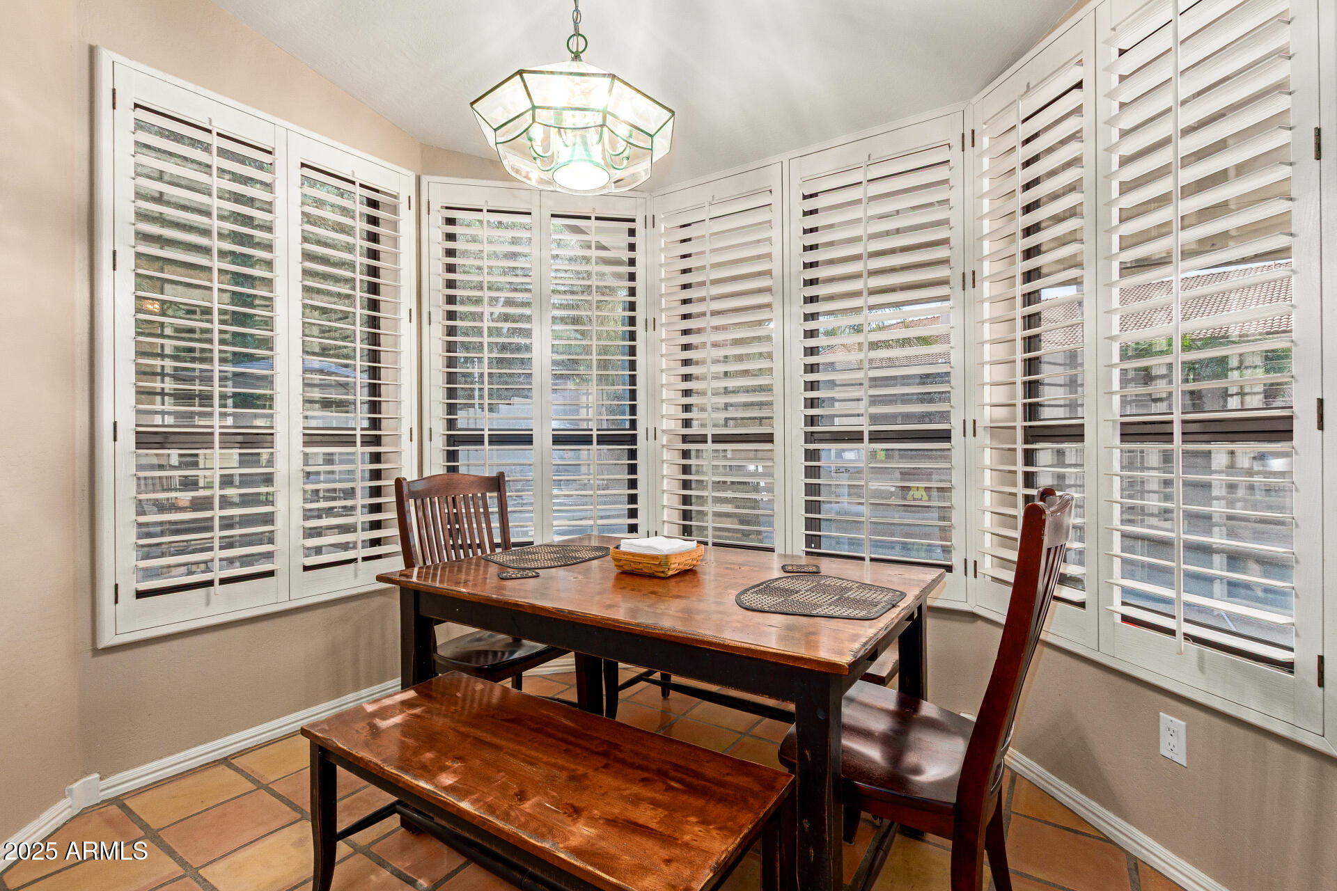 14044 South 33rd Way Phoenix, AZ 85044 - Photo 12 of 59 a view of a dining room with furniture window and outside view