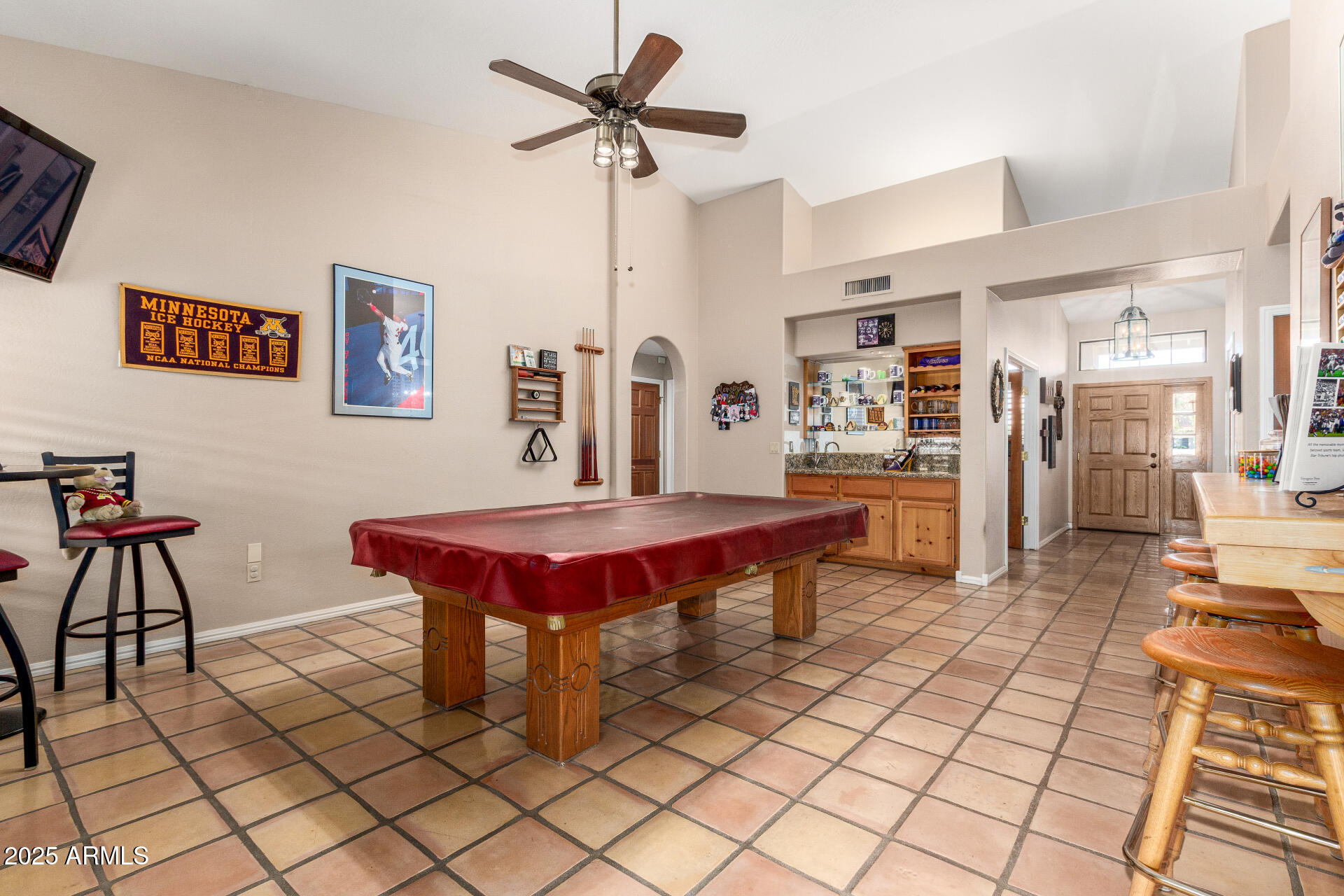 14044 South 33rd Way Phoenix, AZ 85044 - Photo 13 of 59 a large kitchen with a table and chairs