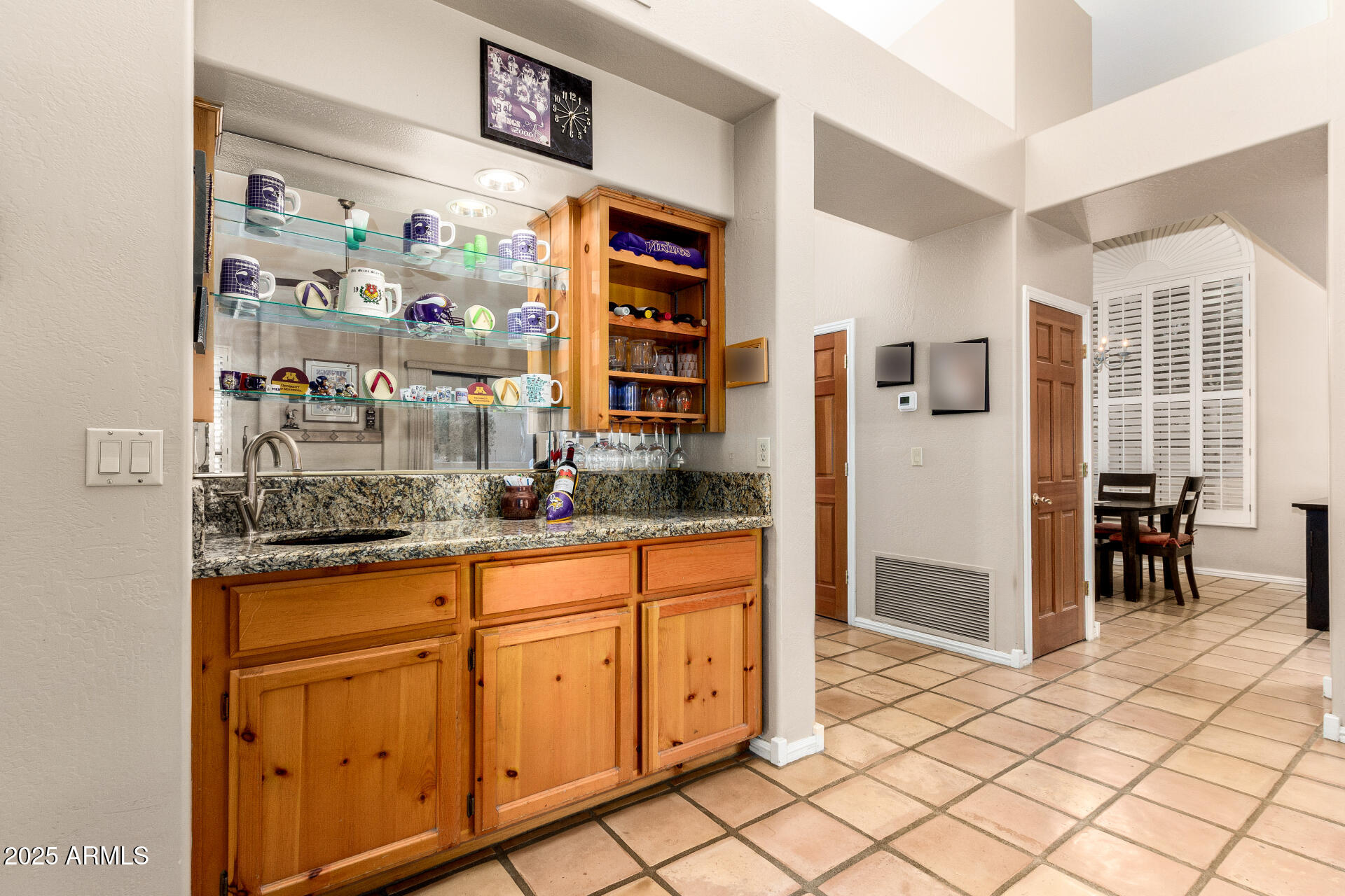14044 South 33rd Way Phoenix, AZ 85044 - Photo 16 of 59 a kitchen with stainless steel appliances granite countertop a refrigerator and a sink