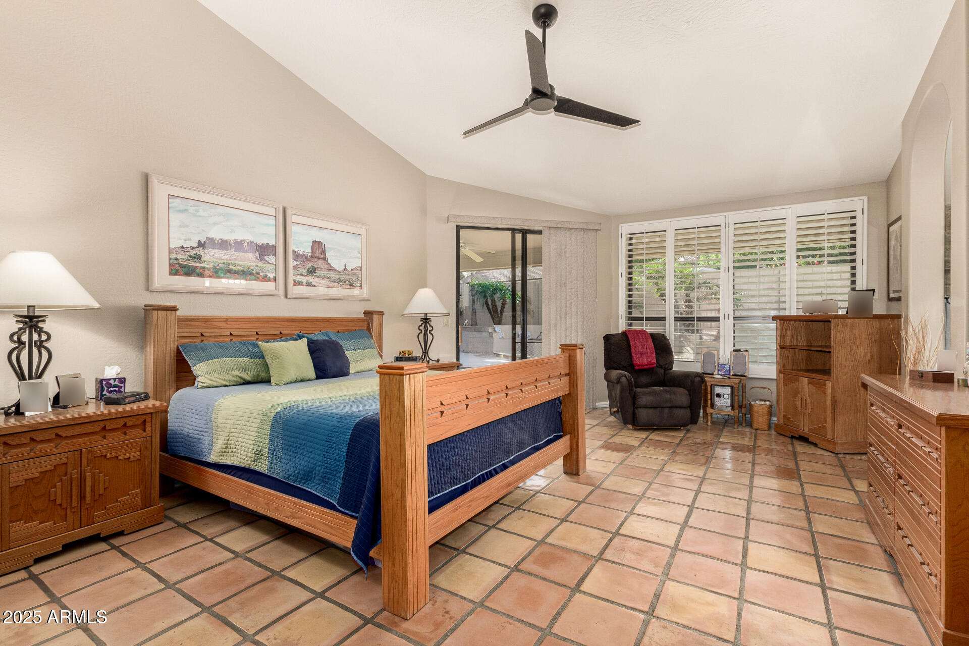 14044 South 33rd Way Phoenix, AZ 85044 - Photo 17 of 59 a bedroom with a bed and wooden floor