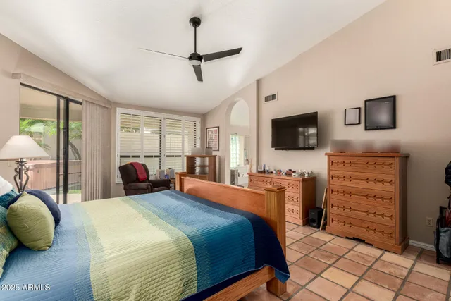 a kitchen with stainless steel appliances granite countertop a refrigerator and a stove