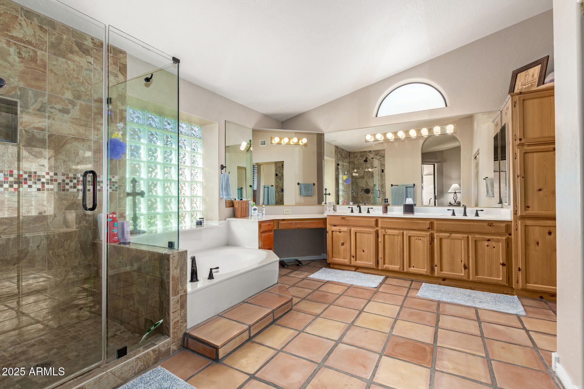 14044 South 33rd Way Phoenix, AZ 85044 - Photo 19 of 59 a large white bathroom with a glass door shower and sink