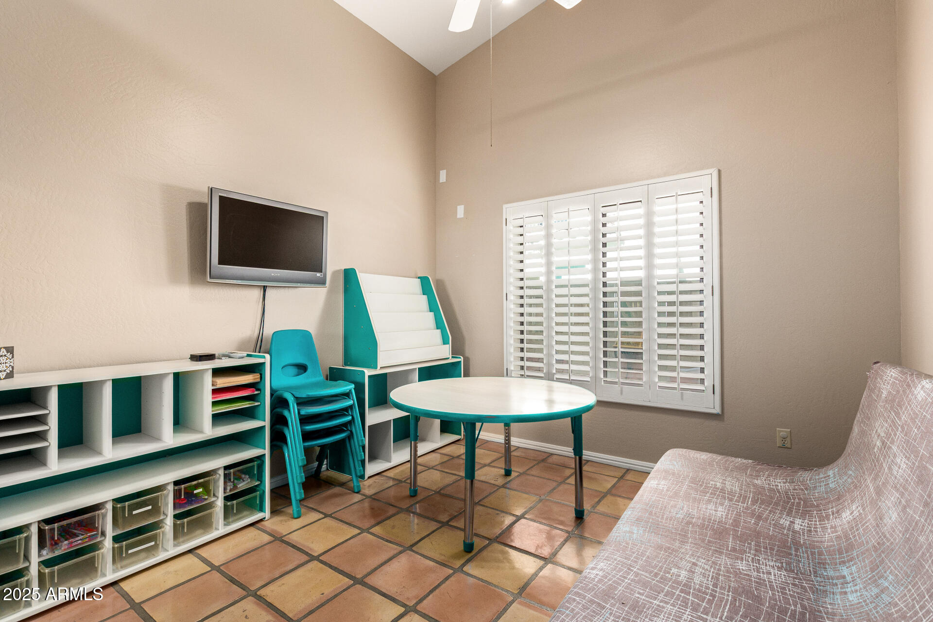 14044 South 33rd Way Phoenix, AZ 85044 - Photo 22 of 59 a bedroom with furniture and a flat screen tv
