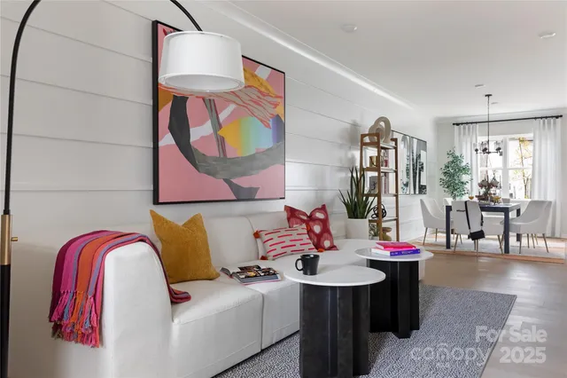 a living room with patio and a table