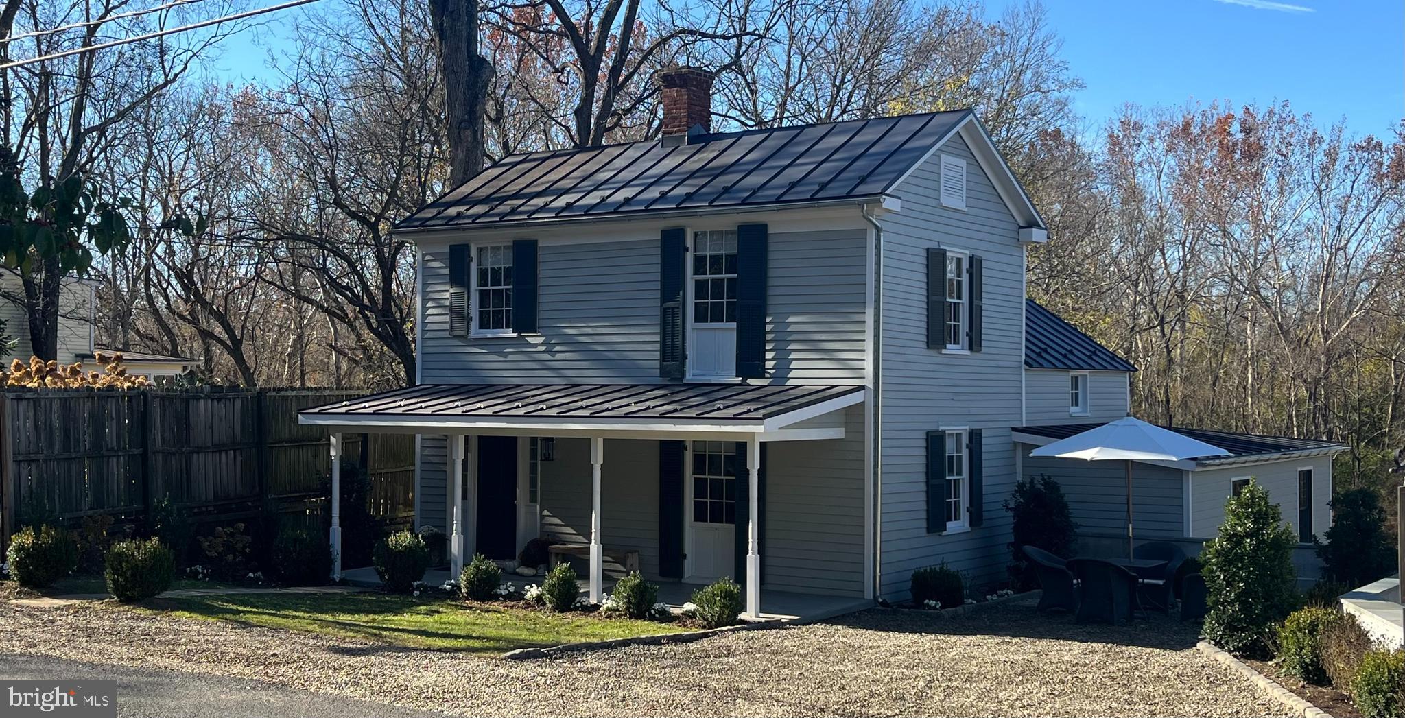 1690 Millwood Road Boyce, VA 22620 - Photo 1 of 44 a front view of a house with garden