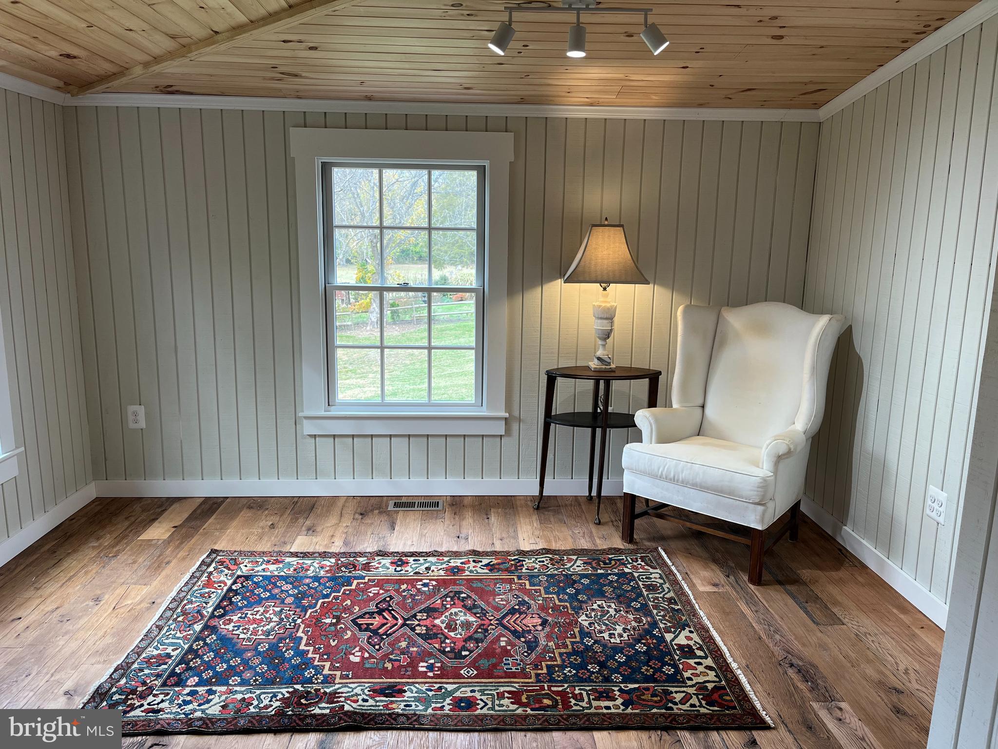 1690 Millwood Road Boyce, VA 22620 - Photo 19 of 44 a living room with furniture and a rug