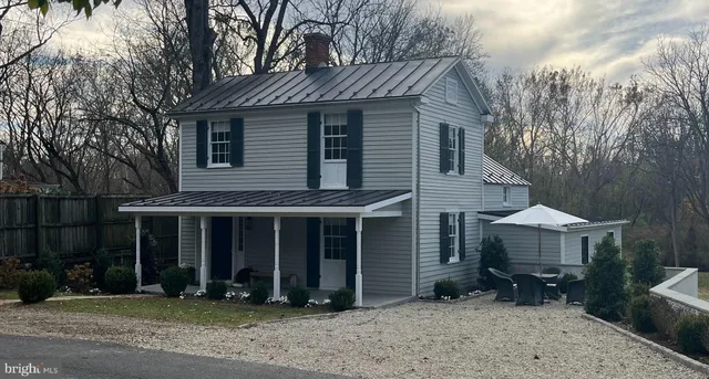 a view of a house with a swimming pool
