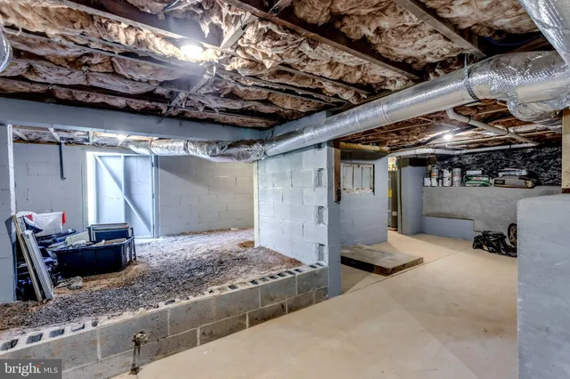 a view of yard with swimming pool and green space