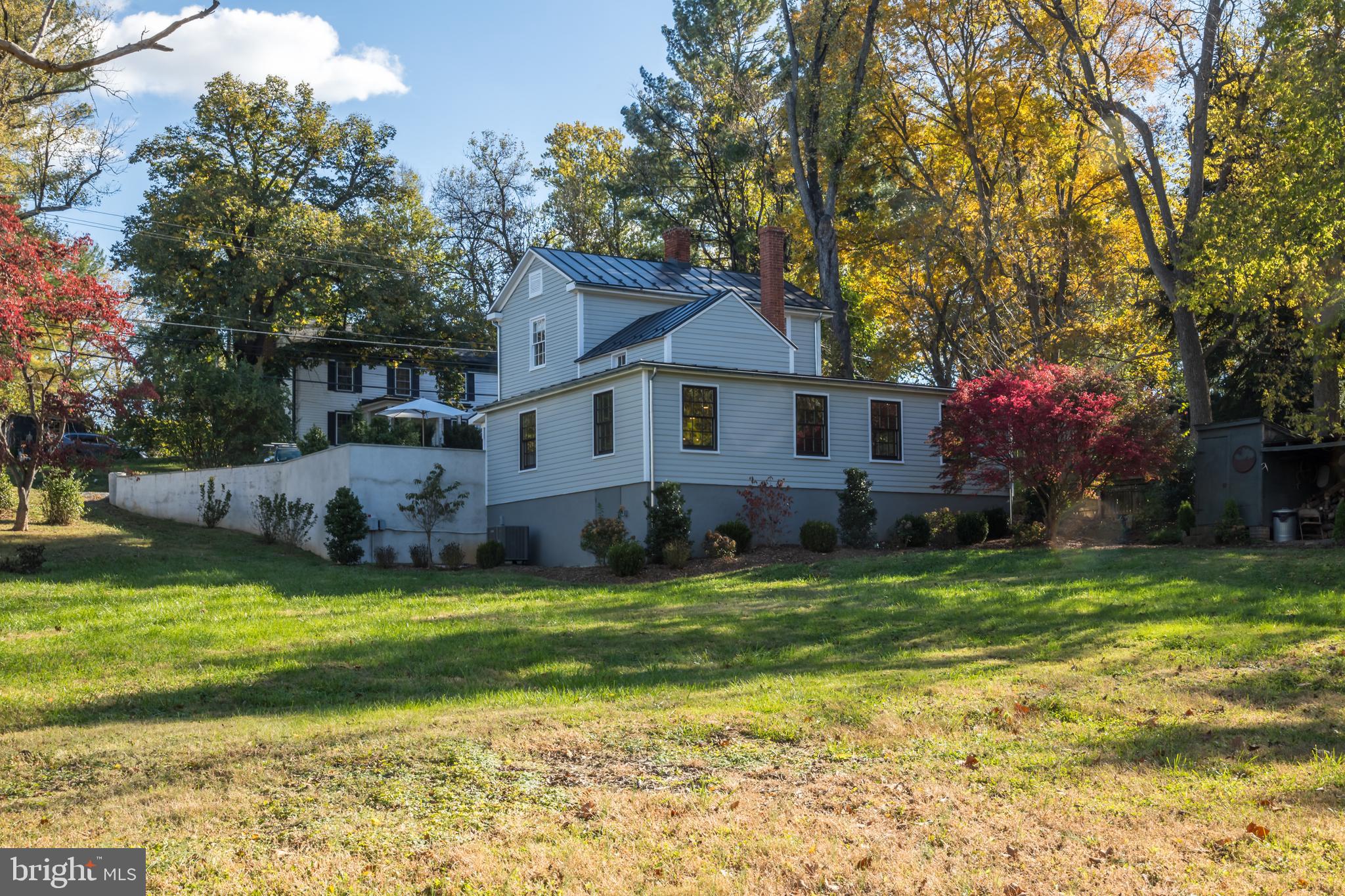 1690 Millwood Road Boyce, VA 22620 - Photo 35 of 44 a front view of a house with a yard