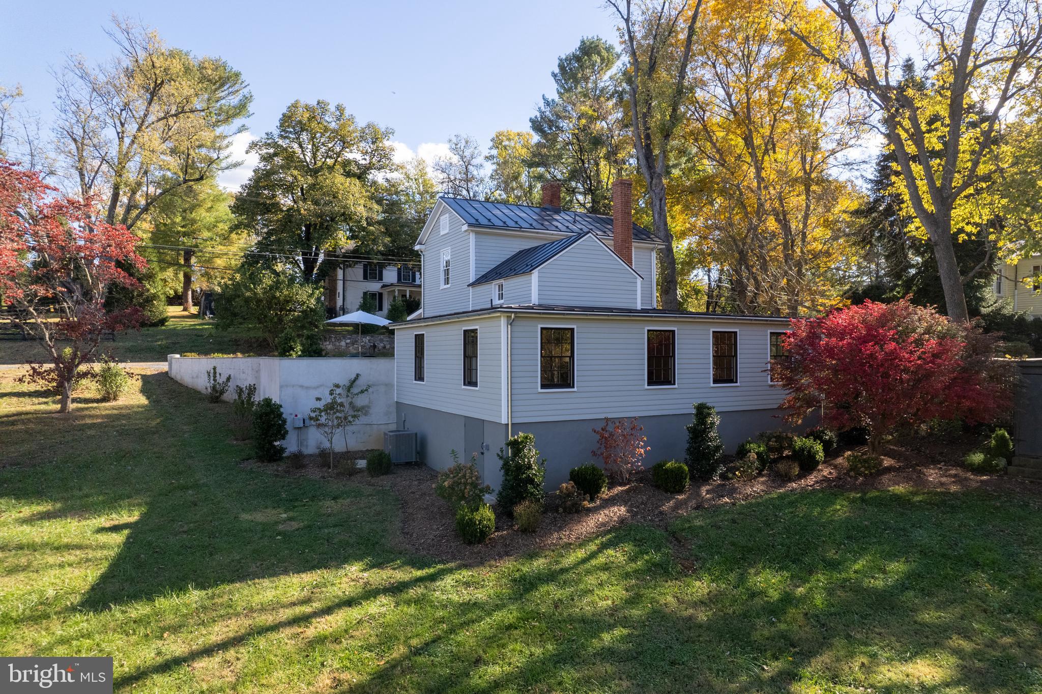 1690 Millwood Road Boyce, VA 22620 - Photo 41 of 44 a front view of a house with garden