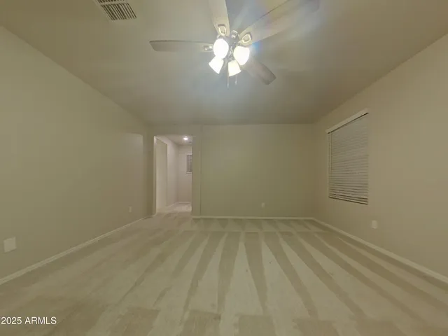 a kitchen with stainless steel appliances granite countertop a sink and a stove