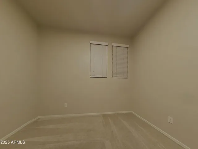 a bathroom with a sink a vanity and a mirror