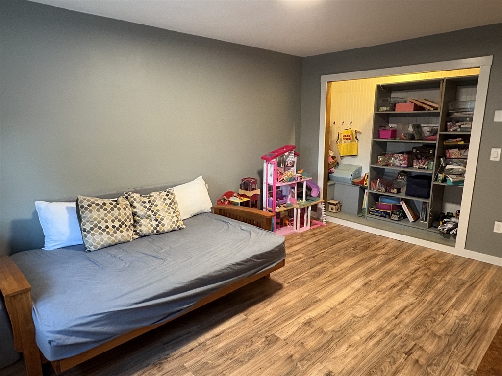 11 Potter Road Douglas, MA 01516 - Photo 12 of 41 a living room with furniture and a wooden floor