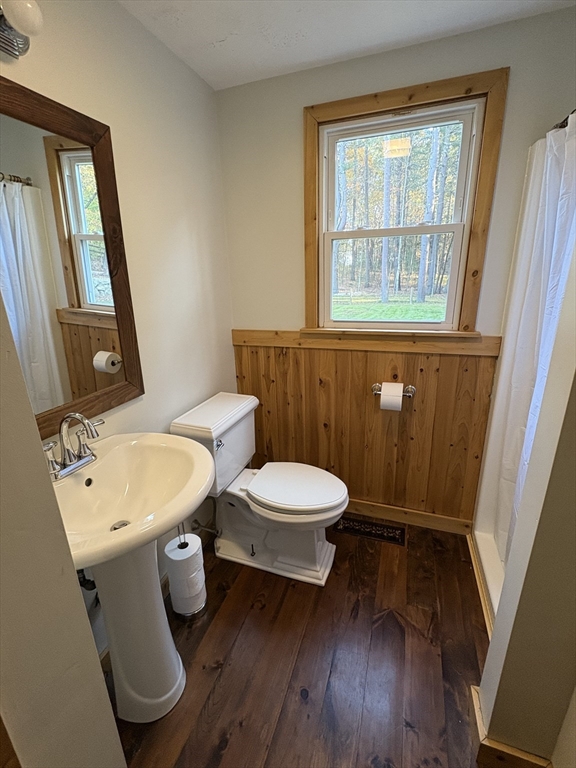 11 Potter Road Douglas, MA 01516 - Photo 20 of 41 a bathroom with a toilet a sink and a mirror