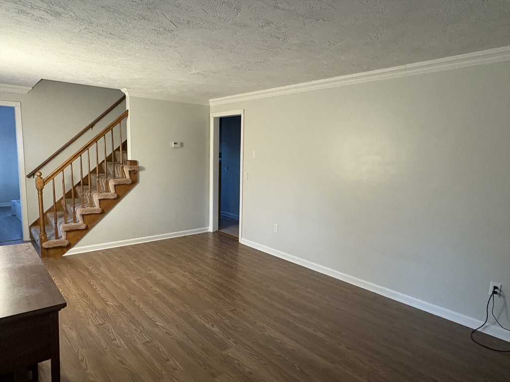 11 Potter Road Douglas, MA 01516 - Photo 25 of 41 a view of an empty room with wooden floor