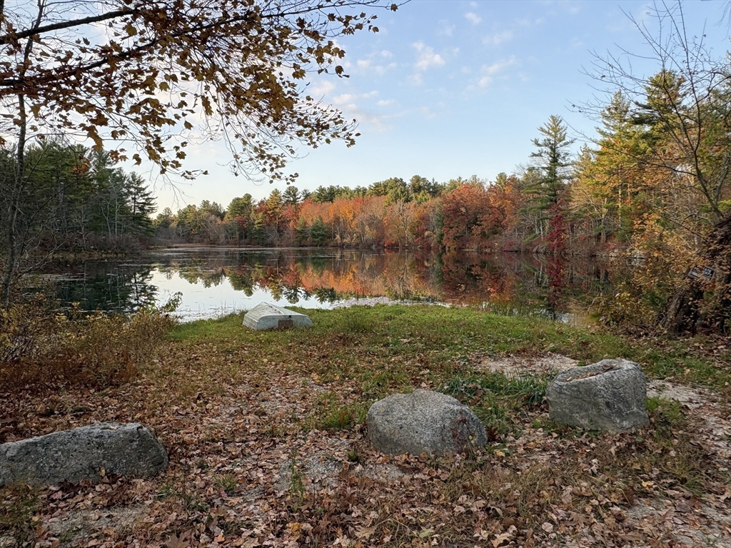 11 Potter Road Douglas, MA 01516 - Photo 39 of 41 a view of a lake with a mountain in the background
