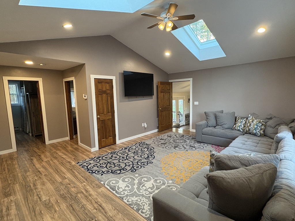 11 Potter Road Douglas, MA 01516 - Photo 7 of 41 a living room with furniture and a flat screen tv