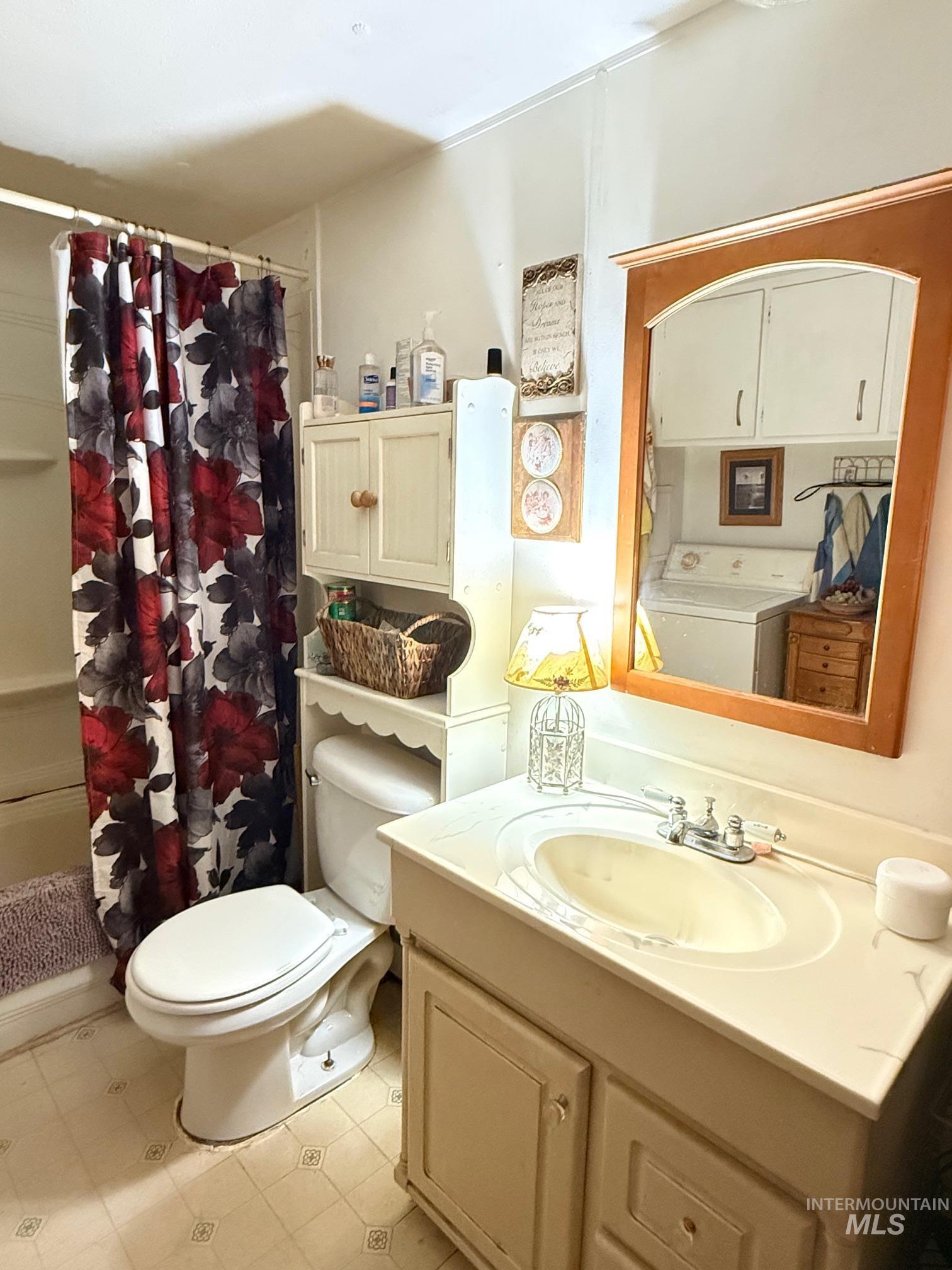 5742 Grangemont Road Orofino, ID 83544 - Photo 12 of 25 Bathroom vanity with an integrated sink and base cabinetry